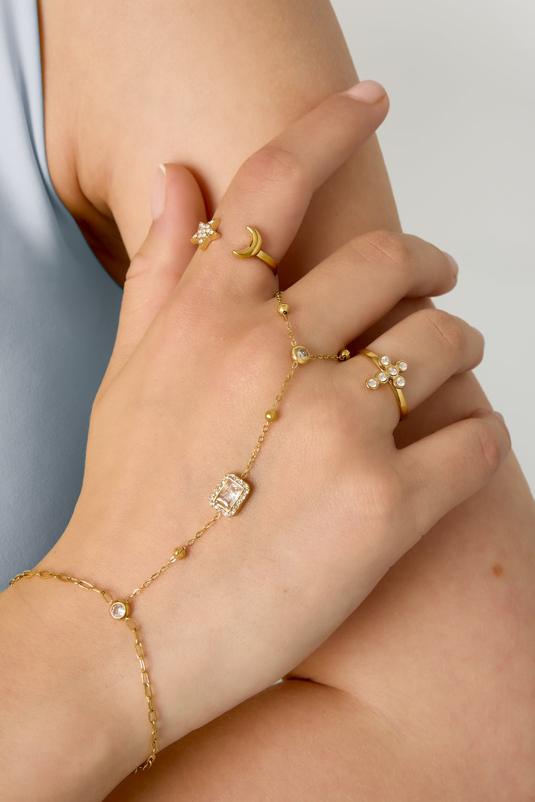 Handkette mit gerahmtem Statement-Stein
